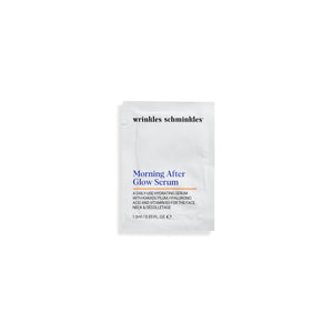 Woman using Morning After Glow Serum Sachet as part of her skincare routine